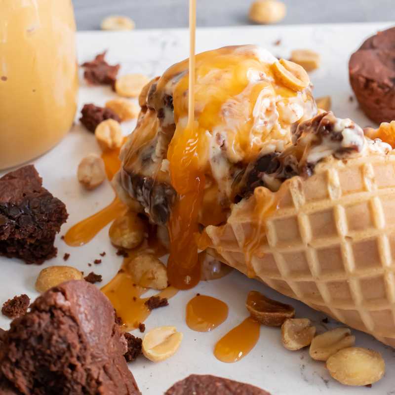 salted caramel ice cream in a cone with brownies and peanut butter